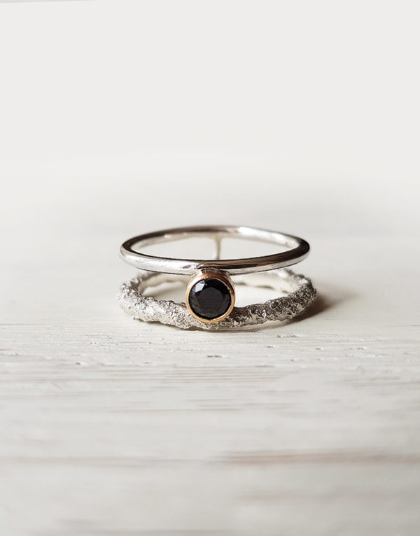double silver ring with black stone