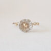 flower silver ring with gold droplets