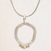 minimalist asymmetrical silver pendant for woman