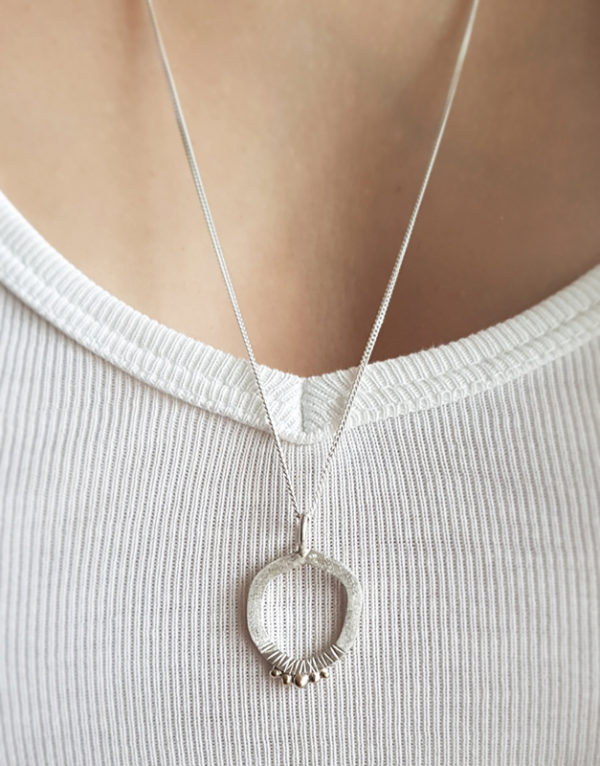 modern silver pendant with chain