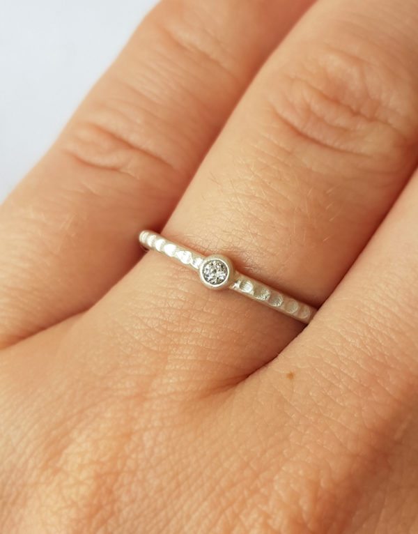 minimalist white gold proposal ring
