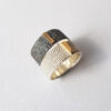 unique silver ring with gold