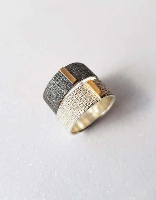 unique silver ring with gold