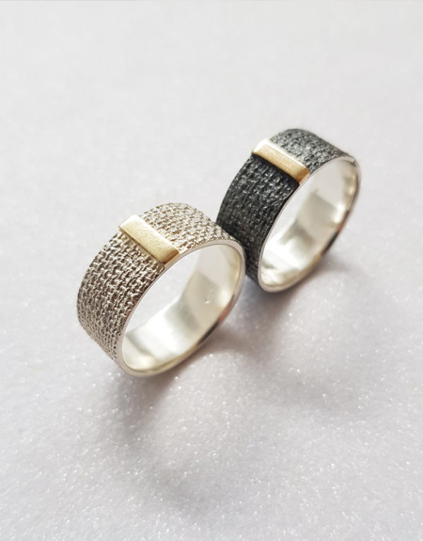 wide sterling silver ring with gold