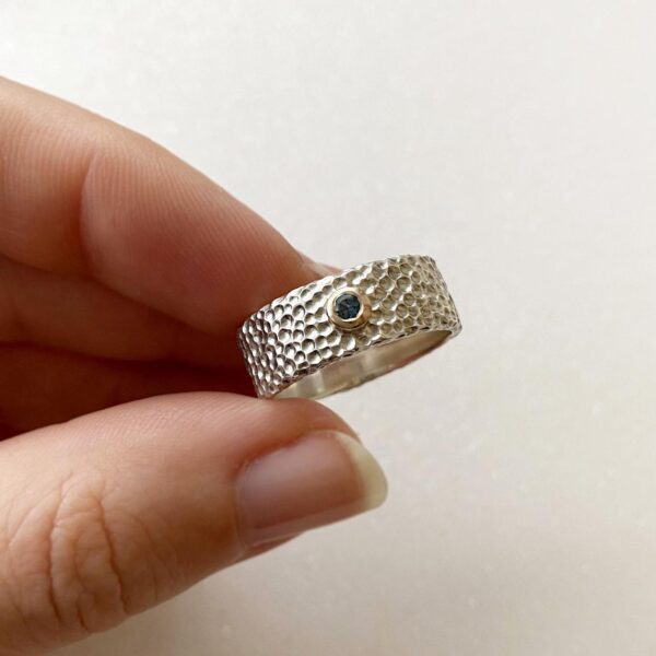 silver ring with topaz