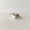 silver ring with emerald
