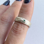 One of a kind silver ring with tiny emerald