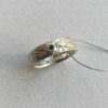 One of a kind silver ring with tiny emerald