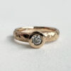 Handcrafted rose gold ring with diamond