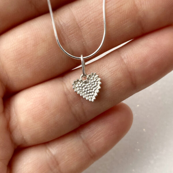 Tiny cute heart pendant in sterling silver