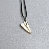 Paper plane pendant in 14K gold