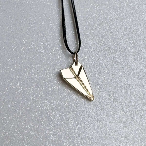 Paper plane pendant in 14K gold